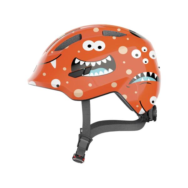 CASQUE ENFANT BABY ABUS SMILEY 3.0 ORANGE MONSTER IN MOLD AVEC REGLAGEOCCIPITAL T.S 45 / 50